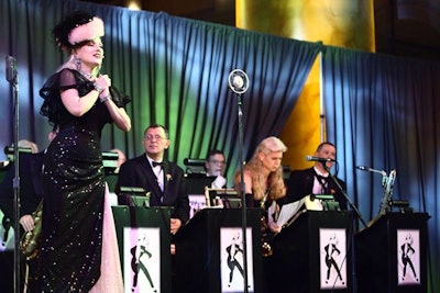 Vintage entertainment put a retro spin on the 50th anniversary gala for Washington, D.C., radio station WAMU 88.5 in November last year. In an homage to its popular 'Hot Jazz Saturday Night' program, Doc Scantlin and His Imperial Palms Orchestra performed big-band hits, complete with costume changes and dance routines.
