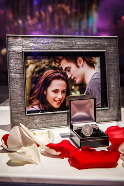 The prop rings from the series were on display in the party space alongside a photo of the stars.