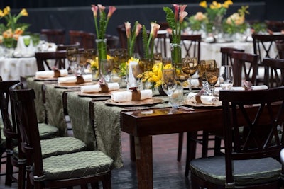 Evoking the forest with textured moss-colored fabrics and Fruitwood tables.