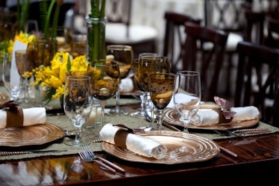 Gold Swirl Chargers, Amber Glassware, and Beehive Flatware.