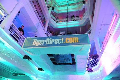 At TigerDirect.com and Intel's first Tech Holiday bash, DJ Supersede performed from a booth that floated between the floors of Miami's Moore Building.