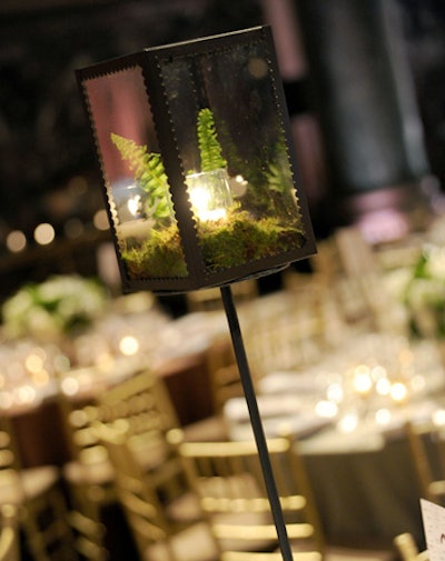 David Stark’s table designs at the fall gala for New Yorkers for Children included high and low glass containers filled with moss, ferns, and candles.