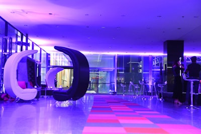 Once inside, guests followed Flor's red-tiled carpet. Blue lighting and lounge furniture added to the more informal atmosphere.