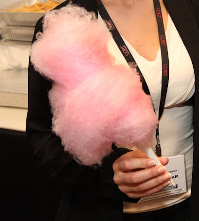 Market brought in a cotton candy machine. The pink, fluffy dessert was served in a miniature shopping cart, and the chef invited guests to step up to the machine to twirl their own cones.