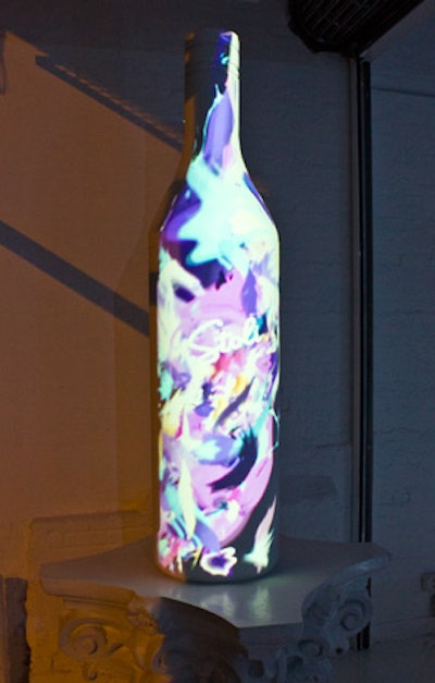 UrbanDaddy installed an 8-foot-tall replica of a Stoli bottle at the entrance and used it as a surface for colorful projections.