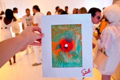 Guests created their own artwork at the spin-art booth where they dropped small amounts of paint onto a spinning paper.