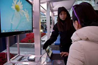 The plaza's Channel Gardens were surrounded with temporary stands where visitors could test out the new Windows Surface tablets.