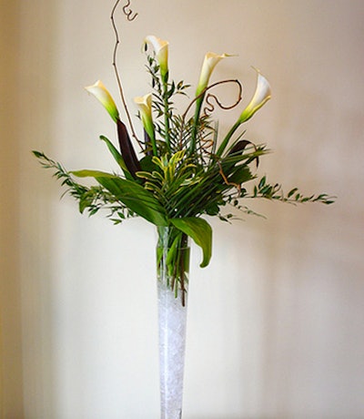 If you need a last-minute florist, don’t fret: King West Flowers is available to craft seasonal bouquets like the he Ice Queen, a display of calla lilies, kiwi lime branches, and assorted greens in a tall vase.