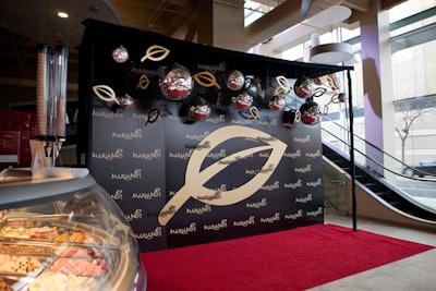 A step-and-repeat with the Mariano's logo was gussied up with a red carpet and a slew of hanging disco balls.