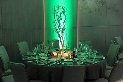 Taking cues from the event's colour scheme, the Microsoft events team used green uplighting in the Vinci Ballroom of the Four Seasons Hotel.