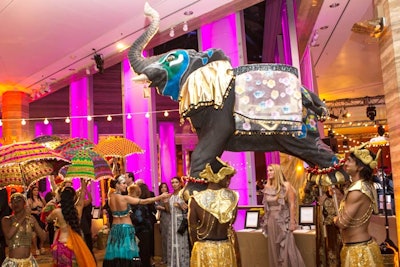 In keeping with the event's Bollywood theme, an elephant made by Primetime Amusements led guests in a parade to the dining space at InterContinental Miami.