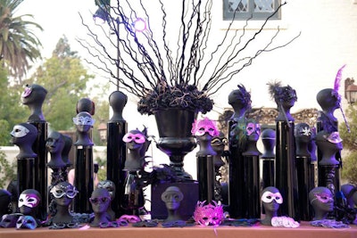 A welcome table at the entrance displayed 300 designer masquerade masks from which guests could select.
