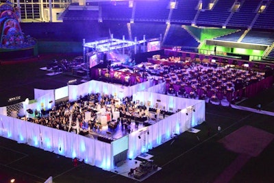 Best Buddies hosted its annual gala on the field of Marlins Park in Miami, building two rooms to house the reception and dinner concert. The draped spaces not only designated the different portions of the evening but also gave the 850-person event a sense of intimacy.
