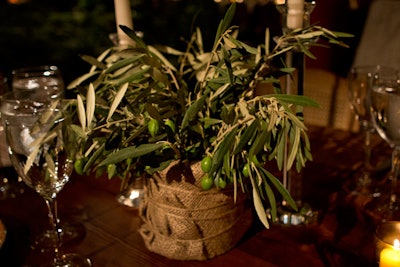 At the Lowline 'Anti-Gala,' producers Van Wyck & Van Wyck topped tables with centerpieces comprised of potted rosemary, mint, geranium leaves, and olive branches.