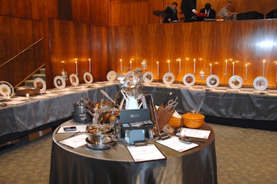 LMac Events put extra effort into the look of the silent auction display, which included a table of cookware items donated by Victorinox, Le Creuset, Wüsthof, Anolon Nouvelle, and Mario Batali by Dansk. On the mezzanine, Joelle & the Pinehurst Trio played live jazz tunes.