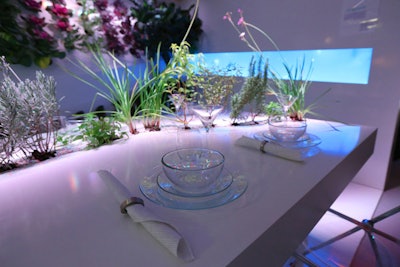 A particularly attention-grabbing booth—and one that had attendees buzzing—was Haworth's table designed by 4240 Architecture. Inspired by the concept of urban agriculture, the table had a wall aquarium and live flowers, vegetables, and greenery.