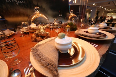 Marc Blackwell designed a table for national sponsor La Crema and filled the space with whimsical, sea-inspired touches. Glass domes covered seashells that were spray-painted gold, and small sea urchins covered porcelain soup tureens.