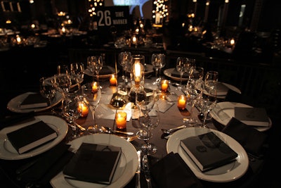 Inspired by the Edison bulb used for the event's logo, the production team built custom lamps that served as the centerpieces for the dinner tables.