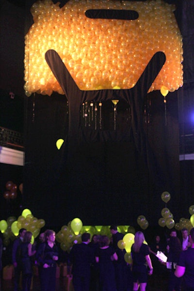 Guests could release their balloons into a giant Jerry can-shaped netting structure. The concept was designed to allow people to visualize their donations in a whimsical way.
