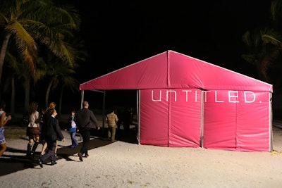 Guests headed to the Untitled Art Fair V.I.P. preview and vernissage on Monday approached the oceanfront location through a pink tent façade that also served as a sign fronting Ocean Drive.