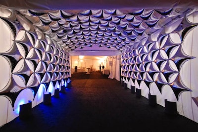 The Paintbrush ball in Chicago celebrated Marwen's silver anniversary with ubiquitous pops of the metallic hue. Guests entered the dinner tent through a tunnel of silver balloons.