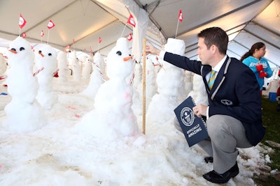 The 370 tons of real snow was part of a Guinness Book of World Records attempt to build the most number of snowmen in an hour. The stunt resulted in the construction of 1,200 individual sculptures.