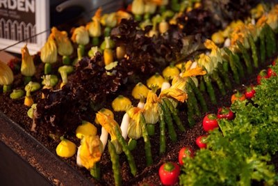Schaffer’s Genuine Foods created an edible garden for a YouTube event at the Museum of Flying in Santa Monica. The “earth” was made from chopped black olives, breadcrumbs, and puffed wild rice.