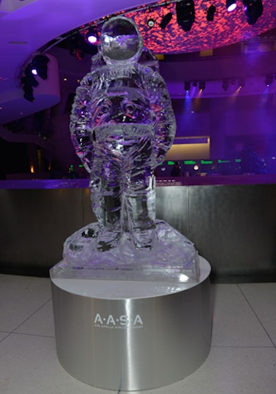 Just beyond the checkpoint, an astronaut-shaped ice sculpture stood on a pedestal marked with A.A.S.A.—the Axe Apollo Space Academy—an acronym the brand is using in its campaign.