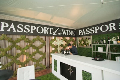 Food festival Chicago Gourmet took over Chicago's Millennium Park in September. Event Creative was tasked with building out the tents that housed tasting bars for brands, including Constellations Brands' 'Passport to Wine' tent, where the designers accented the white bar with faux boxwood hedges.