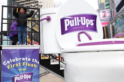 Kids and adults alike were invited to take turns flushing the giant 10-foot toilet.