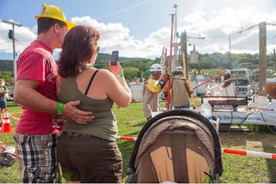 Onlookers gaze at the Electric Show provided by National Grid.