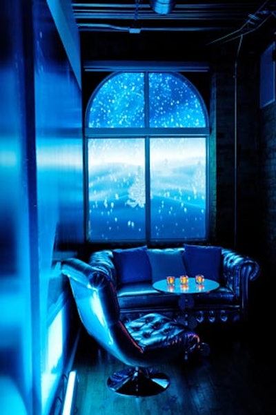 For Toronto marketing company Capital C's annual holiday party in 2011, Apex Sound & Light projected 3-D mapped images of falling snow onto the venue's windows. Silver furniture added to the ice theme.