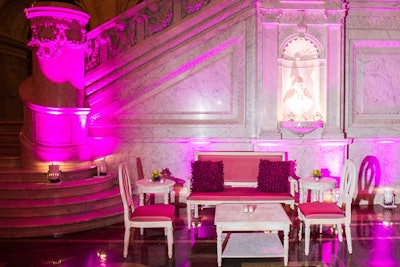 After a four-course meal, guests went downstairs for desserts and dancing. The purple color scheme continued, warming up the venue's natural stone.