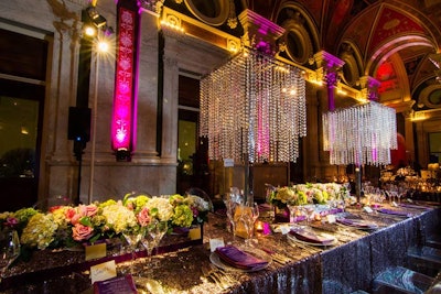 Materials such as crystal and glass lent modern touches to a historic building. Sequined tablecloths added sparkle.