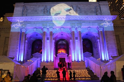 A projection of Phantom of the Opera's symbol—the white mask—washed the façade of the New York Public Library, marking the entrance to the post-performance celebration. Illuminating the library's exterior with the iconic image required special permission from the library.