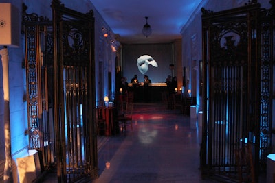 More projections were found inside, with the image of the Phantom mask illuminating drapes placed at the ends of Astor Hall's long hallways. Low lighting in red and blue hues added to the eerie, almost ethereal look.