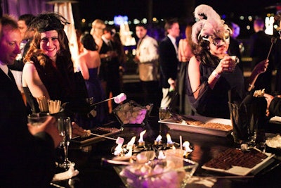 Kapture Vision produced a holiday bash with a masquerade theme for CyberCoders in December at Newport Beach Dunes Resort in Newport Beach, California. Jay's Catering set up a s'more station where guests could fire-roast their own desserts.
