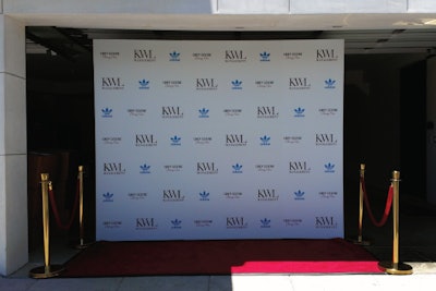 Media wall, red carpet, stanchions, and rope