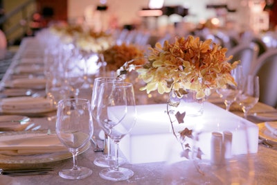 Shiraz Events provided decor for the Sylvester Comprehensive Cancer Center gala in Miami in December. Tabletops were covered in silvery linens, and centerpieces of orchids and silver-coated ivy sat atop glowing white platforms.