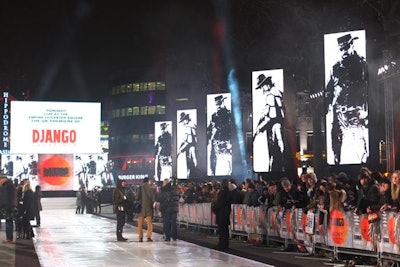 Six 12- by 4-foot LED screens lined the arrivals area for the premiere of Django Unchained in London's Leicester Square. At a stage set up at the end of the carpet for celebrity interviews, more screens displayed images of characters and the movie's logo.