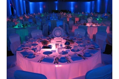 Lighted dining rounds with ice centerpieces