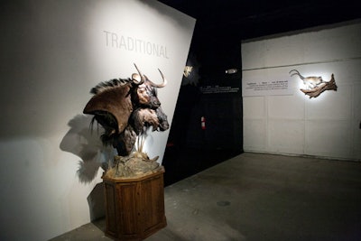 The installation was designed to introduce consumers to the unusual people and stories behind both shows, so the organizers carved out three distinct areas within the space. The white, gallery-like section in the front housed traditional taxidermy. There was also a computer terminal where visitors could play with the Mount Me app, snapping shots of themselves as a mounted piece of taxidermy.