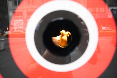 Portholes cut into the window's display invited passersby to see mini showcases of quirky taxidermied animals or video previews of the new shows.