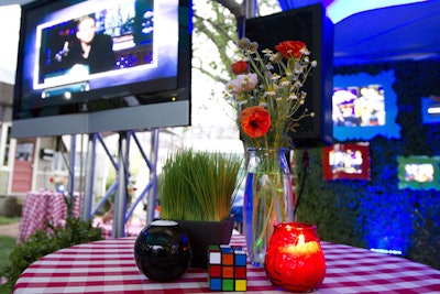 Watch What Happens Live (Bravo) @SXSW: Camp-themed party hosted by Andy Cohen, featuring games, a logo fire pit, and a camp-sign entrance.