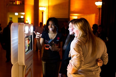 Guest enjoying the Total Rewards photobooth