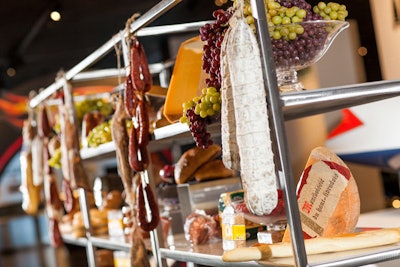 Contemporary Catering also set up a modern Italian charcuterie bar. Servers sliced everything to order while standing in front of a themed back-bar display of meats and cheeses.
