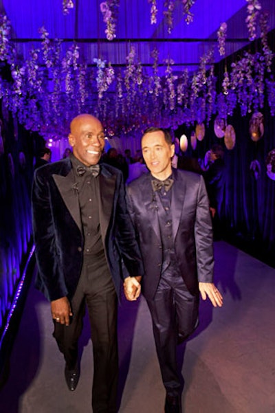 Bailey and Blackmann decided to skip a traditional sit-down dinner reception in favor of a cocktail-style after-party that lasted until after 4.30 a.m. Purple flowers and crystals hung overhead in the hallway that led from the ceremony space to the late-night shindig.