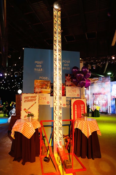 The high striker, a strength testing game, was just one of the many carnival attractions placed in the vast pier venue not only to retain a sense of intimacy, but also keep guests entertained throughout the night.