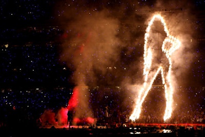 This year's Super Bowl halftime show kicked off with pyrotechnics, putting headliner Beyoncé on stage with a giant flaming silhouette of herself. One producer-reviewer called the opening sequence 'epic TV.'