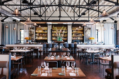 Breezy west midtown seafood restaurant the Optimist opened in May, with a brick-lined dining room and full-length windows. The adjacent oyster bar offers an array of bivalves prepared in a wood-fired oven; a light-filled private room seats 60.